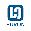 HURON CONSULTING GROUP INC COMMON STOCK USD.01 logo